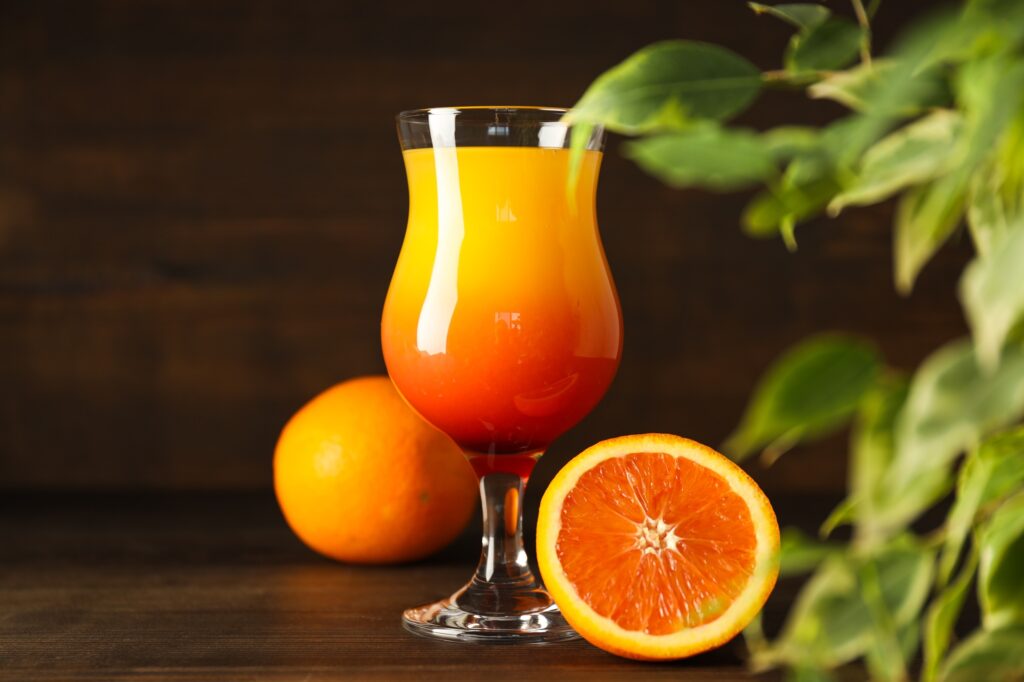 Orange cocktail, concept of fresh delicious summer citrus cocktail